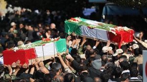 The file photo shows the funeral procession for the border guards killed in a terror attack in southeastern Iran on October 25, 2013.